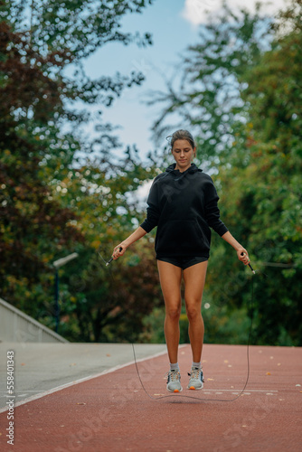 A professional female athlete jumping rope © qunica.com