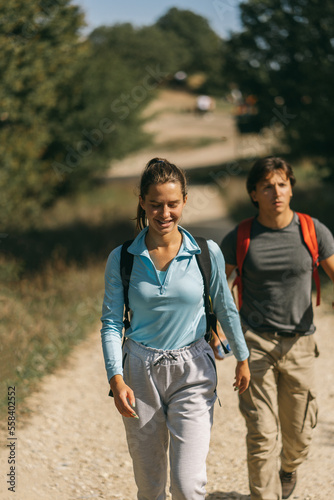 A close up photo of male and female hikers