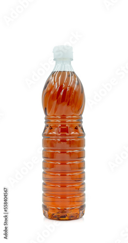 Fish sauce cooking in plastic clear bottle with lid isolated on white background.