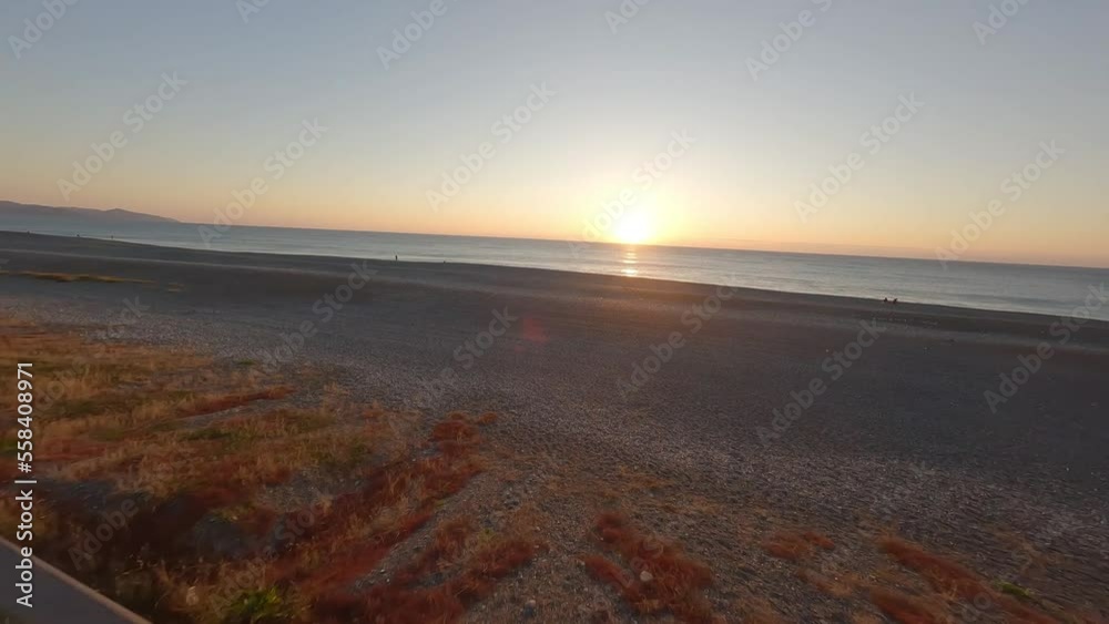 FPV drone sunrise at the beach