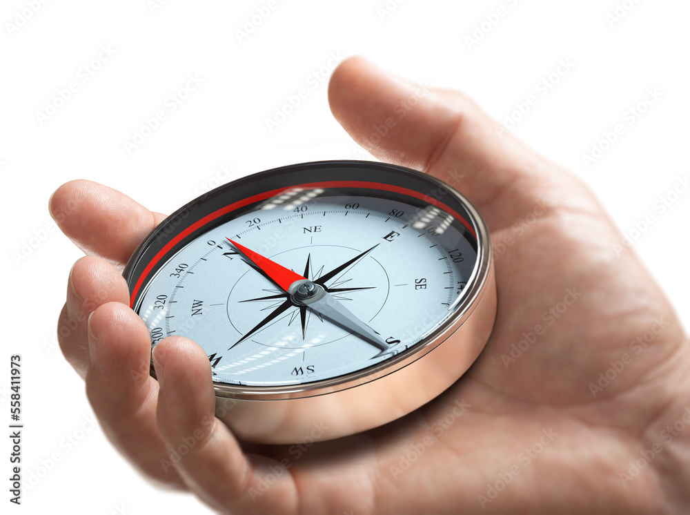 Hand holding a compass over white background. Strategic orientation or direction concept. Hand holding a compass over white background. Strategic orientation or direction concept.