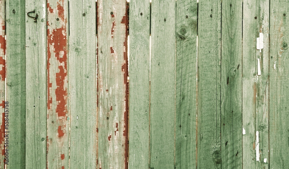 Green Faded Wooden Fence. Old Weathered Wood Planks. Rustic Aged Surface Green Faded Wooden Fence. Old Weathered Wood Planks. Rustic Aged Surface