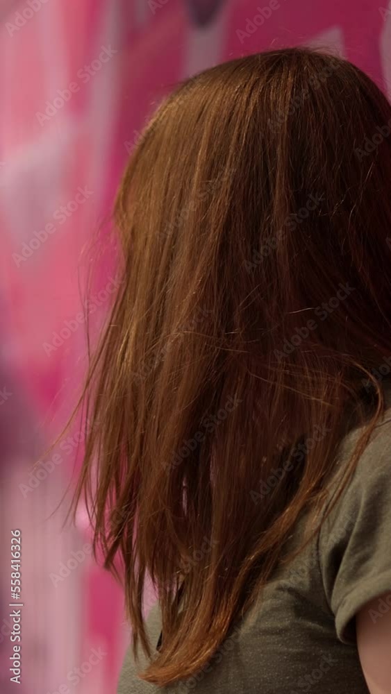 Young happy woman leaning against a colorful house wall - travel photography Young happy woman leaning against a colorful house wall - travel photography