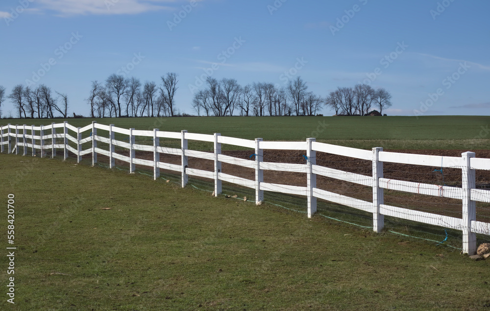 White picket fence in Amish Country, Lancaster, Pennsylvania. White picket fence in Amish Country, Lancaster, Pennsylvania.