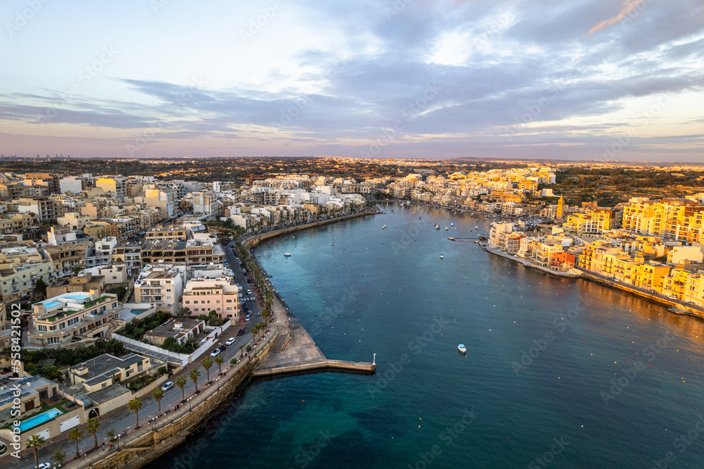 Marsaskala townscape at sunrise, Malta. Aerial drone view