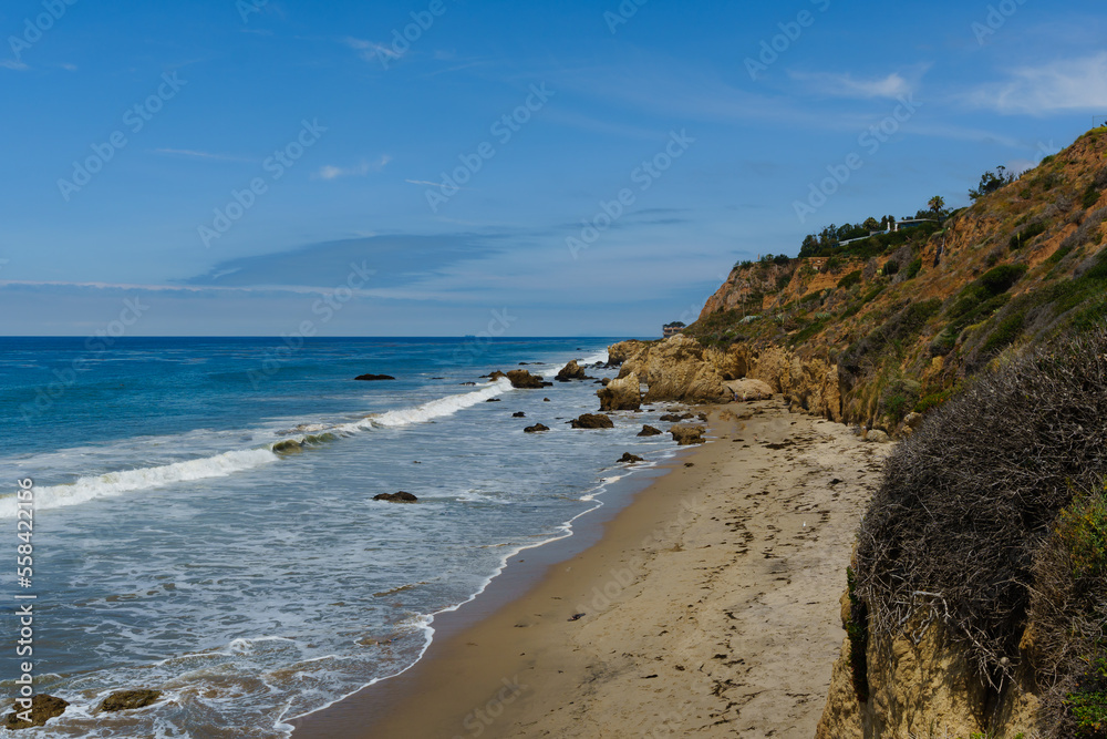 El Matador Beach along the East Pacific Coast Highway in Malibu California. The beach is a collection cliff-foot beaches and bluff top view of the eroding formations, sea stacks, caves and arches. El Matador Beach along the East Pacific Coast Highway in Malibu California. The beach is a collection cliff-foot beaches and bluff top view of the eroding formations, sea stacks, caves and arches.