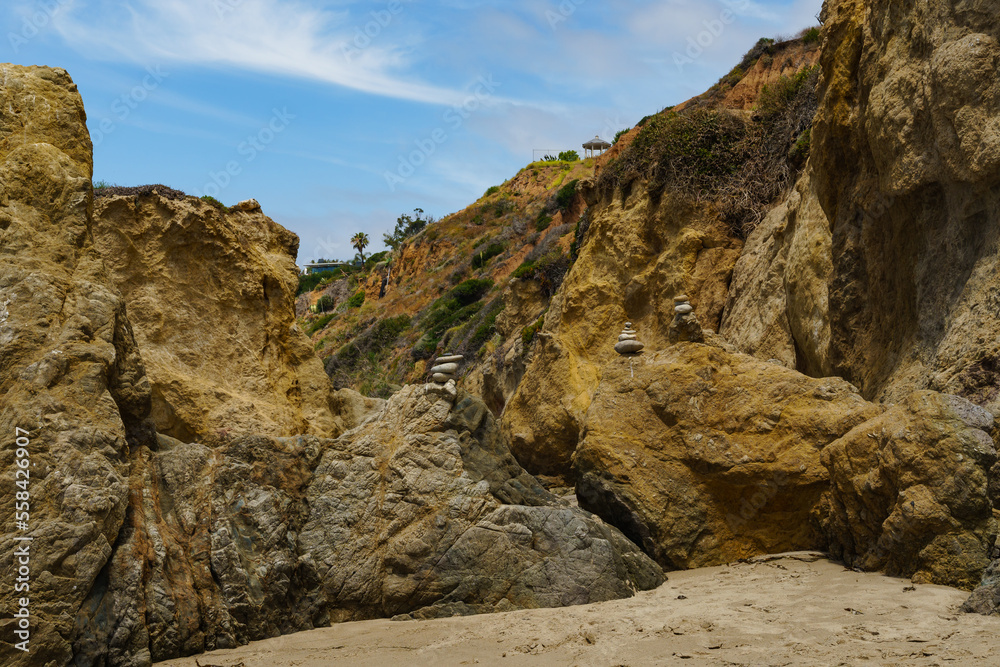 El Matador Beach along the East Pacific Coast Highway in Malibu California. The beach is a collection cliff-foot beaches and bluff top view of the eroding formations, sea stacks, caves and arches. 