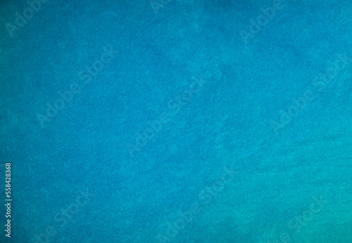 Light blue velvet fabric texture used as background. Tone color blue cloth background of soft and smooth textile material. There is space for text and for all types of design work..