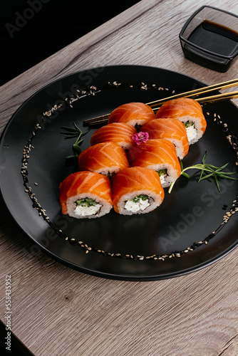 philadelphia sushi roll on a plate.  asian restaurant menu