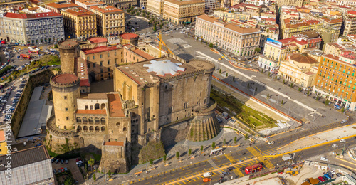Aerial view of Castel Nuovo often called Maschio Angioino, a medieval castle located on the seafront, in the historic center of Naples, Italy. It was a royal seat for the kings of Naples and Aragon.