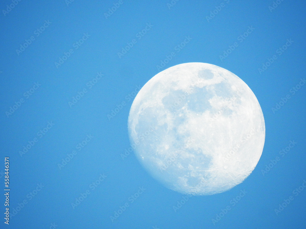 Moon in the blue sky of the day Moon in the blue sky of the day