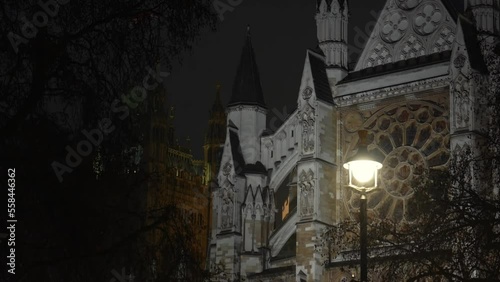 Rainy night in front of Westminster Abbey church, 4k video with this landmark from London. photo