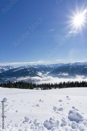 Scenic mountain panorama during wintertime in Salzburg Alps, Austria, Europe. View from Rossbrand mountain on valley and surrounding countryside.