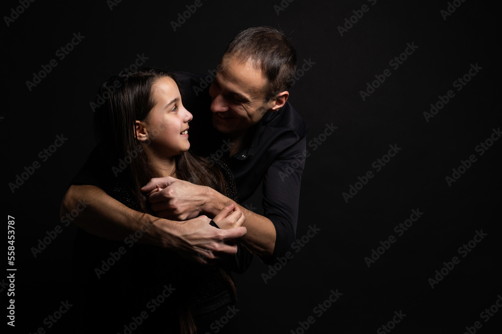 Loving Indian daddy embracing cute little adorable daughter. concept showing love, care, closest person, fathers day Loving Indian daddy embracing cute little adorable daughter. concept showing love, care, closest person, fathers day