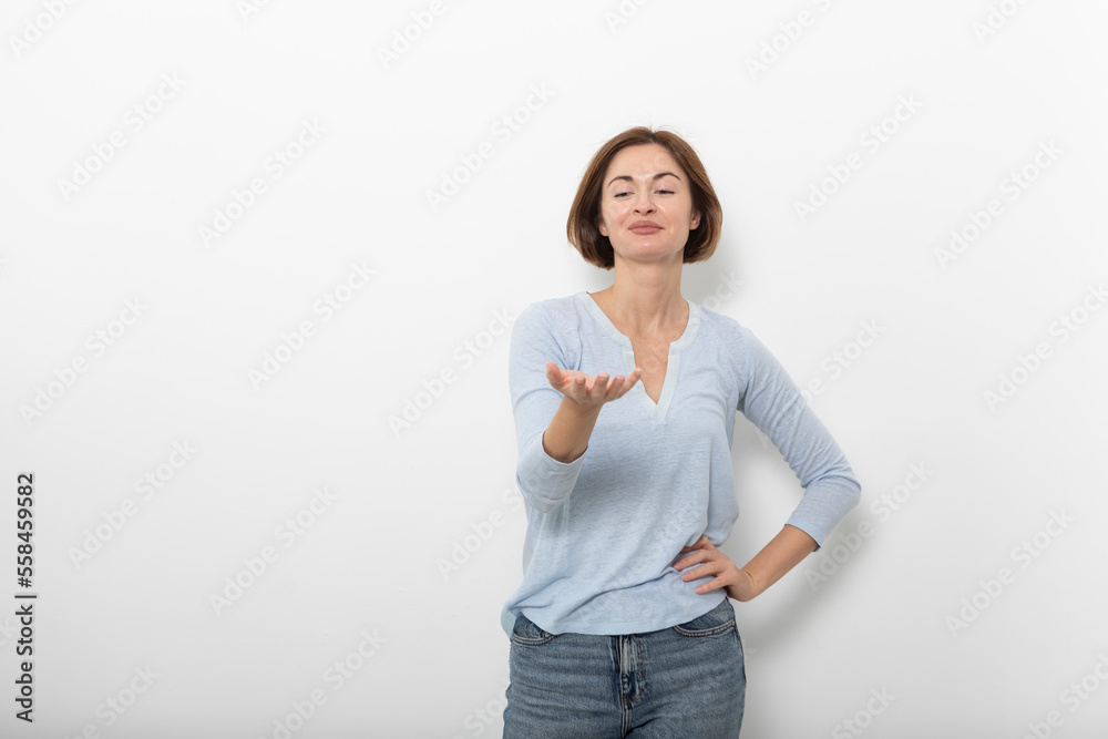 Young happy woman standing isolated on white background Young happy woman standing isolated on white background