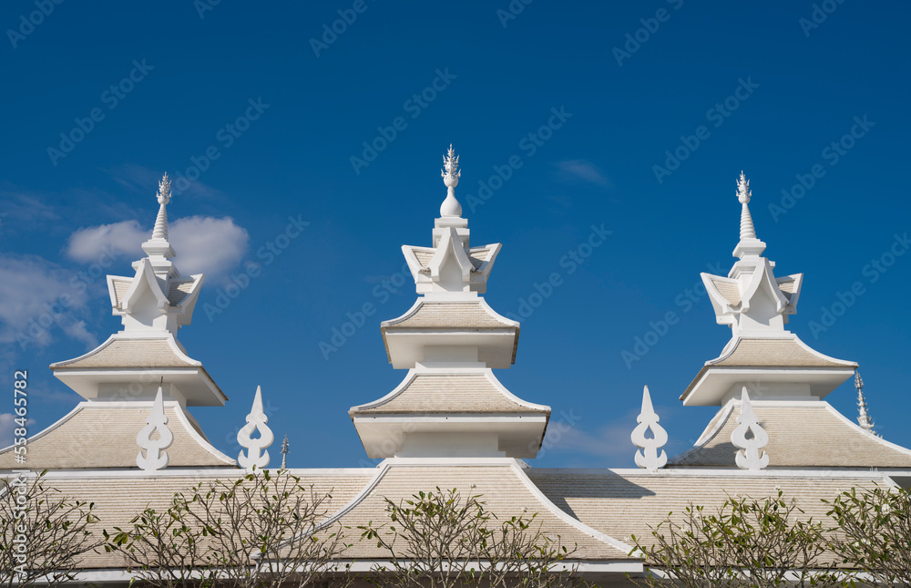 Wat Rong Khun or White Temple complex structures. Temples and detail architectures. It is the most important travel destination in Chiang Rai province. Northern Thailand