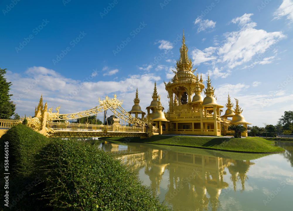 Golden temple or Buddhist Temple. Buddhist temple inside Wat Rong Khun (White Temple). It is the most important travel destination in Chiang Rai province. Northern Thailand