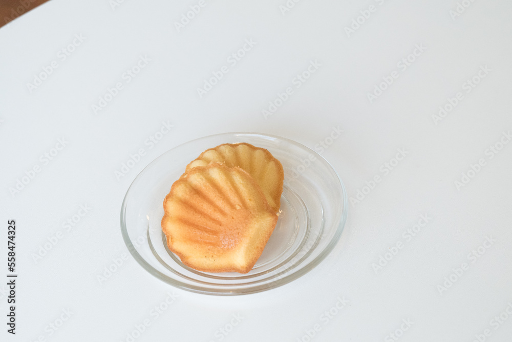 French madeleine cookies on plate,traditional French sweet dessert.