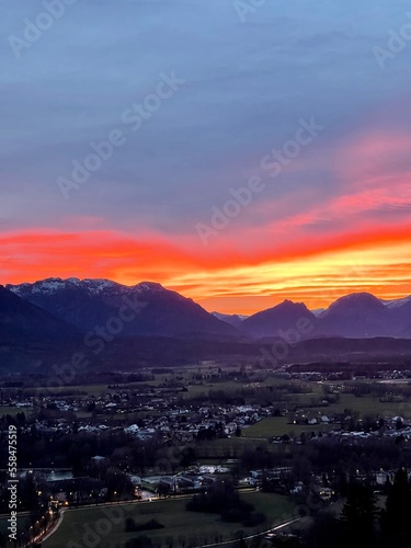 beautiful sunset sky on the background of the horizon with a view of the mountains © Aleks