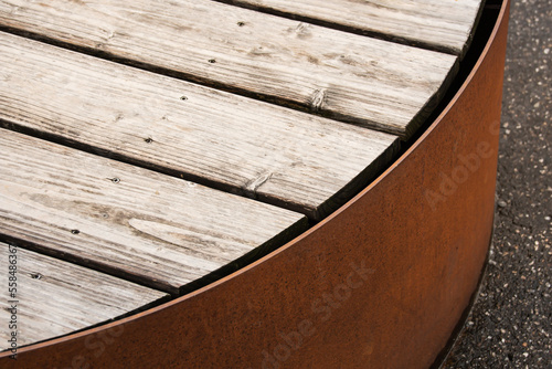 Detail of corten bench with wooden surface