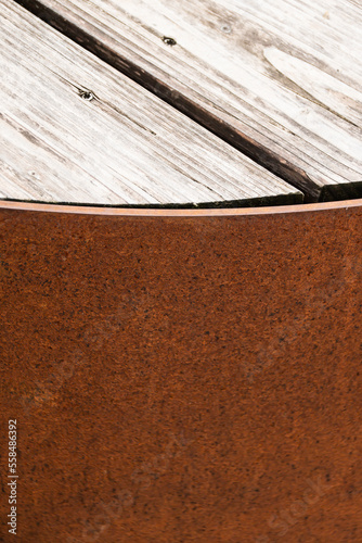 Detail of corten bench with wooden surface