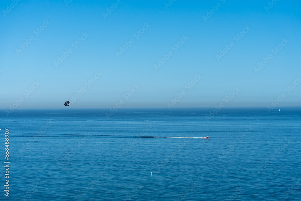Parachute over Mediterranean sea, Costa del Sol, Malaga, Spain  