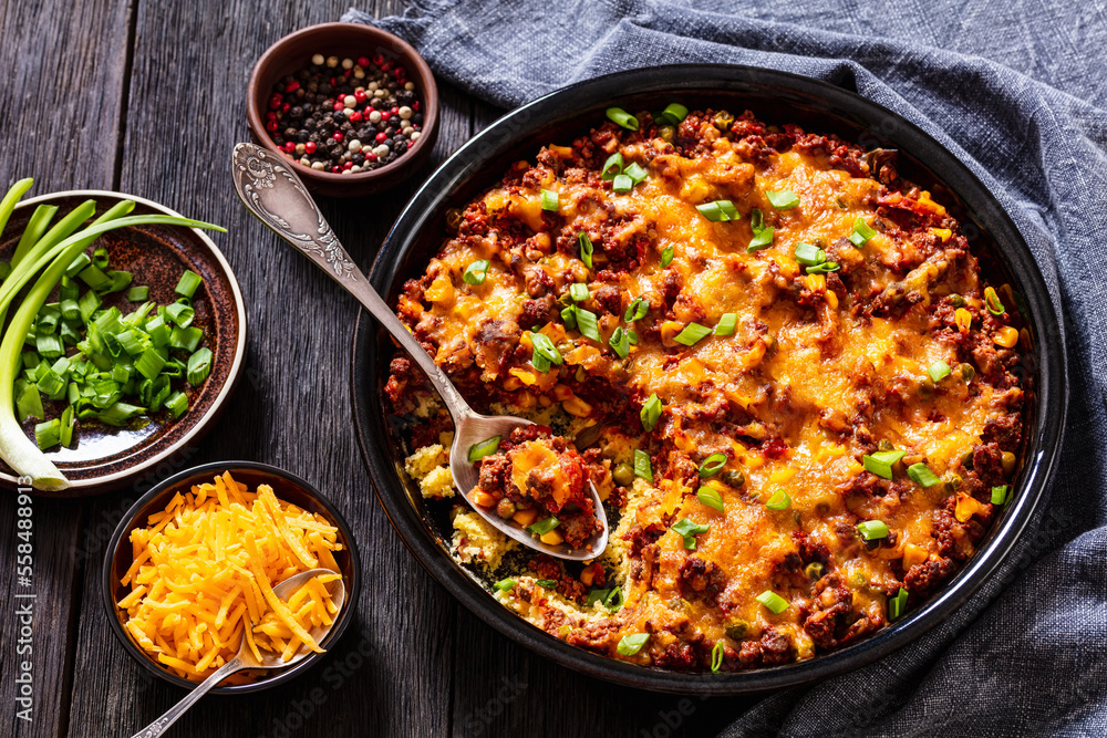 Cajun Beef Cornbread Casserole in baking dish Cajun Beef Cornbread Casserole in baking dish