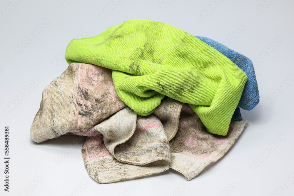Pile of dirty old rag suspended isolated on white background. - obrazy, fototapety, plakaty 