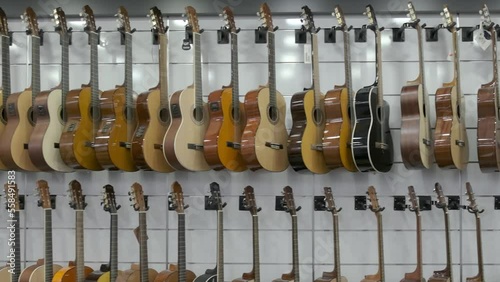hardware store; guitar shop; A lot of guitars; Guitar on the shelf