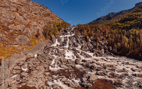 Summer landscape travel of Altai mountains Russia. Aerial view waterfall Uchar photo