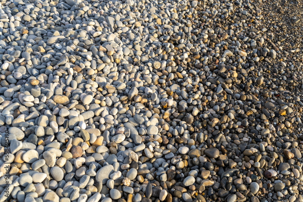 Colored pebble beach texture background Colored pebble beach texture background
