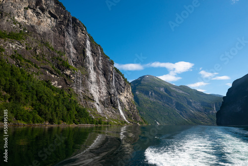 The famous and impressive Seven Sisters (Dei sju systre)  waterfall dropping 250 meters from a cliff in the Geiranger Fjord, Norway photo