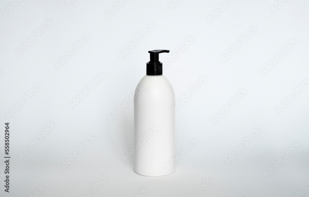 White liquid container for shampoo, gel, lotion, cream, bath foam etc. Blank unbranded cosmetic plastic bottle with black dispenser pump. White liquid container for shampoo, gel, lotion, cream, bath foam etc. Blank unbranded cosmetic plastic bottle with black dispenser pump.