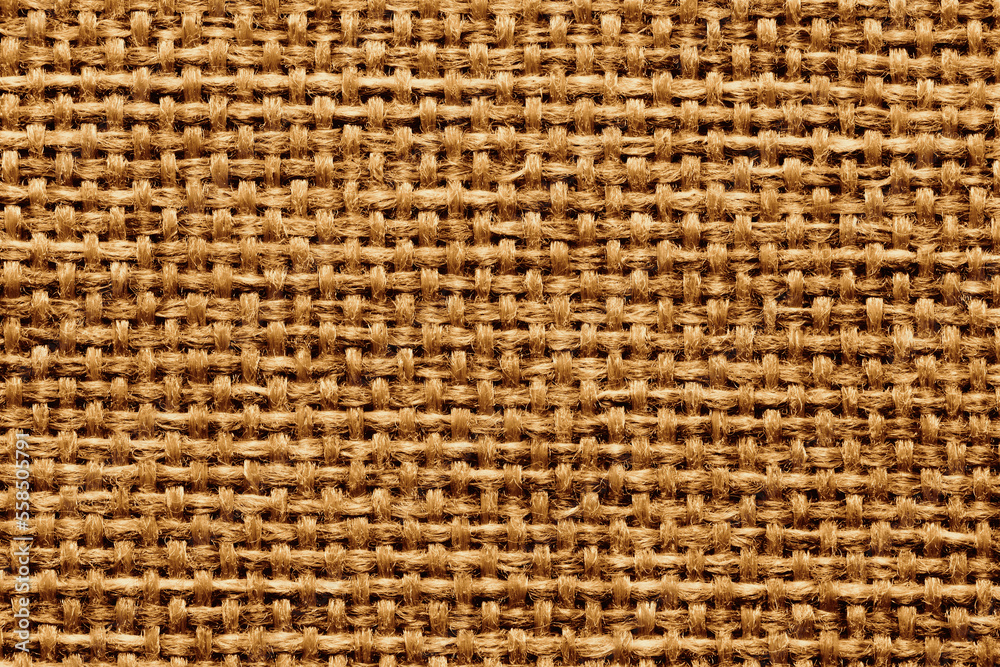 Natural brown linen fabric background. Fiber structure texture. Vintage canvas pattern. Natural brown linen fabric background. Fiber structure texture. Vintage canvas pattern.