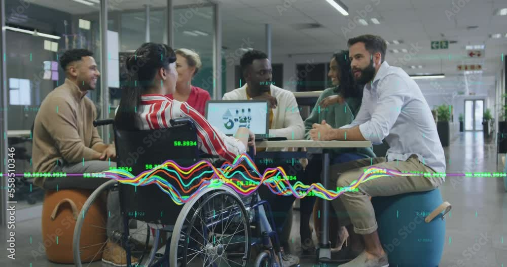 Animation of financial data processing over diverse business people having meeting at office Animation of financial data processing over diverse business people having meeting at office