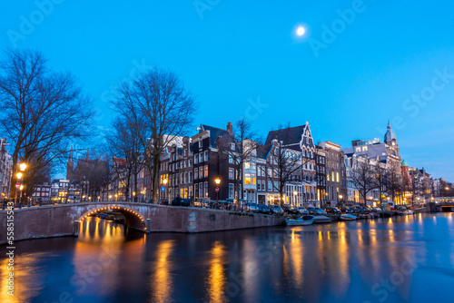 Amsterdam canal at twilight in winter, Amsterdam is the capital and most populous city in Netherlands.