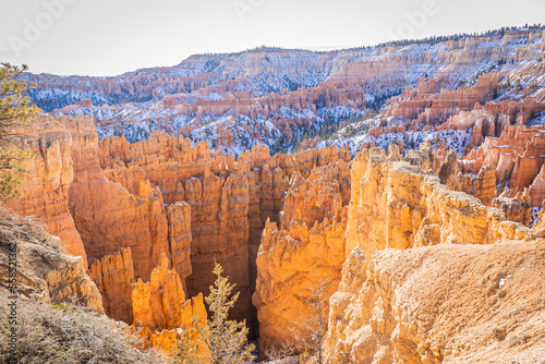 Bryce Canyon accented in freshly fallen snow and distant mountains