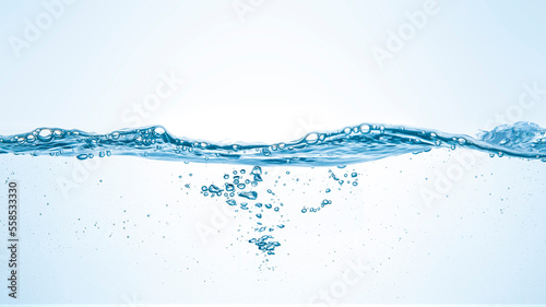 water splash on white background.Water flowing in waves and creating bubbles. 