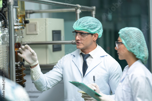 Scientist wearing glasses a...