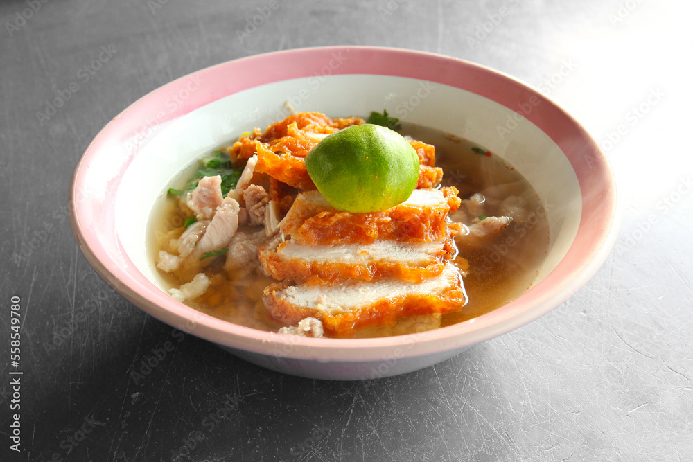 Fried Chicken Noodles Put the chopped fried chicken into pieces, boiled pork. and lime add flavor to Thai street food
Fried Chicken Noodles Put the chopped fried chicken into pieces, boiled pork. and lime add flavor to Thai street food
