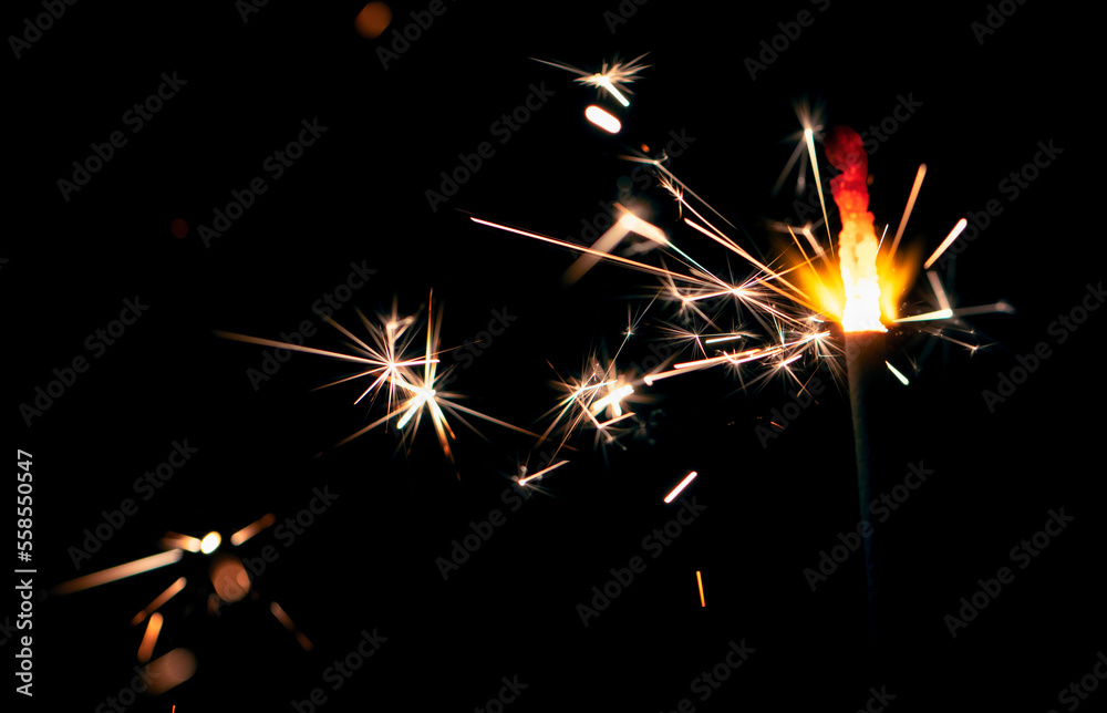 Sparks of Bengal fire on a black background