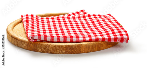 Red check napkin and board for pizza on white background. Red napkin on wooden round board isolated.