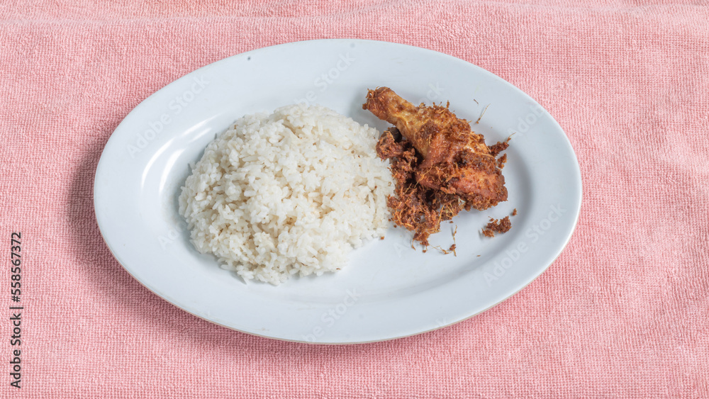 Ayam goreng Kalasan is a fried chicken dish with special spices originating from the Kalasan area, Sleman Yogyakarta. Ayam goreng Kalasan is a fried chicken dish with special spices originating from the Kalasan area, Sleman Yogyakarta.