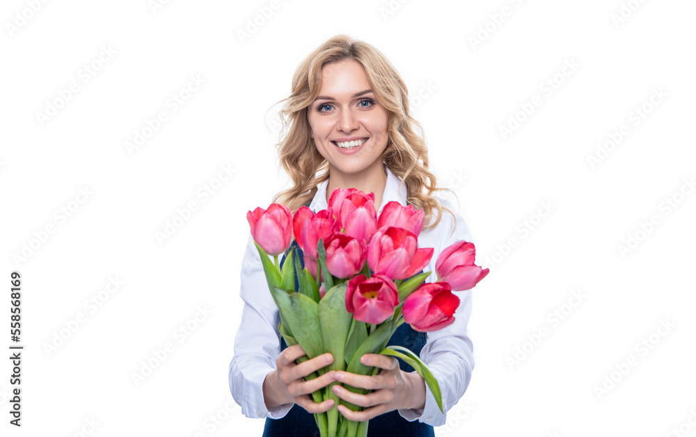 smiling young woman in apron with spring tulip flowers isolated on white background smiling young woman in apron with spring tulip flowers isolated on white background