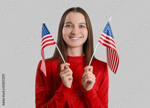 Young woman with USA flags ...