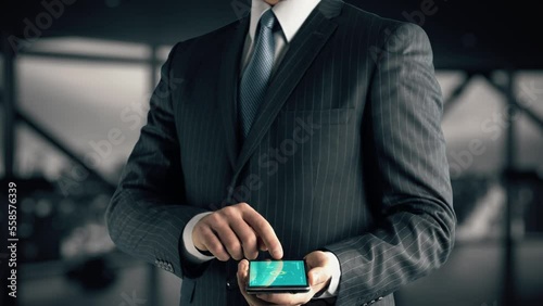 Businessman with Decentraland hologram concept photo