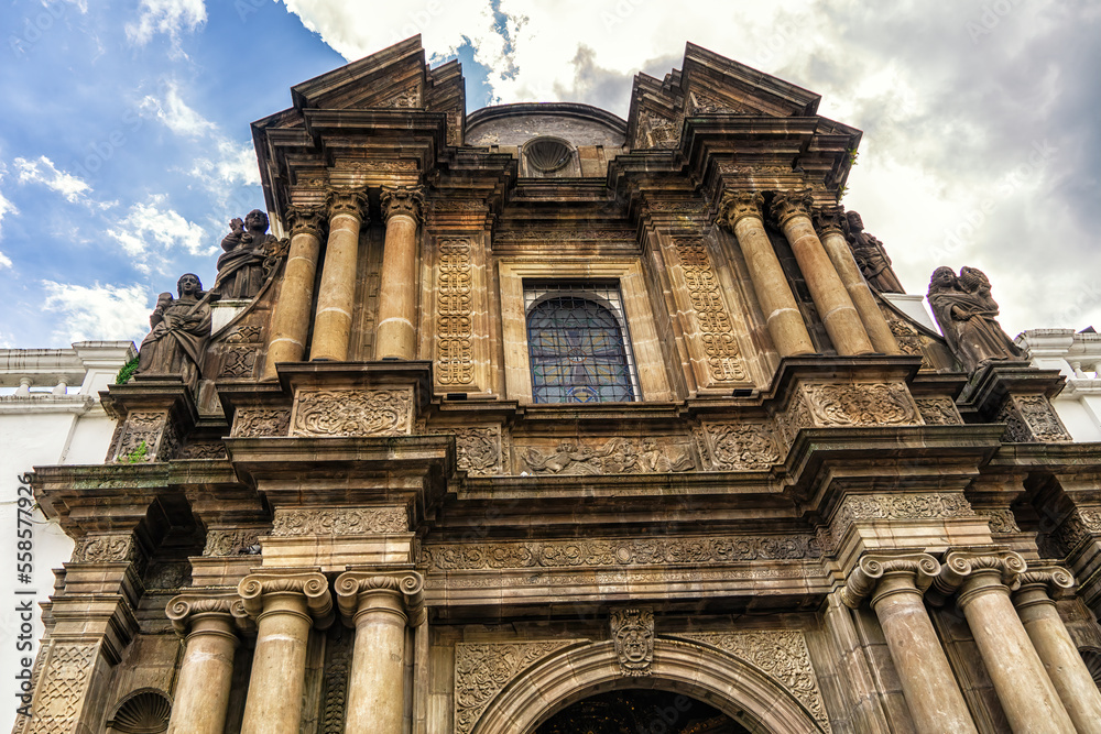 Intricate stone facade entrance of Cathedral in Quito