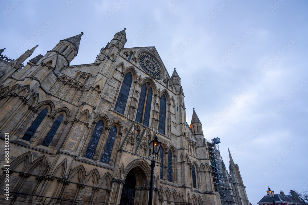 Fototapeta premium York Minster , Roman Catholic Gothic church and cathedral in York old town during winter evening at York , United Kingdom : 1 March 2018