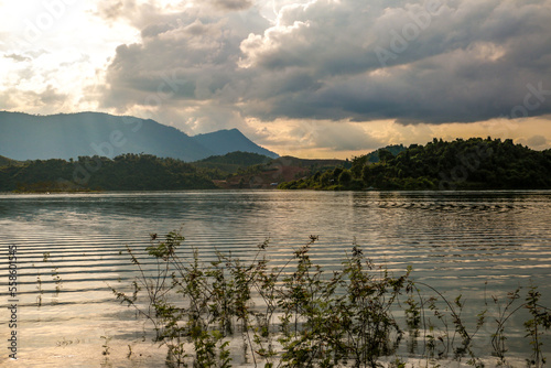 Beautiful wallpaper of the nam ngum lake in Laos close  to Luang Prabang. Travel to wildlife Asia with boat