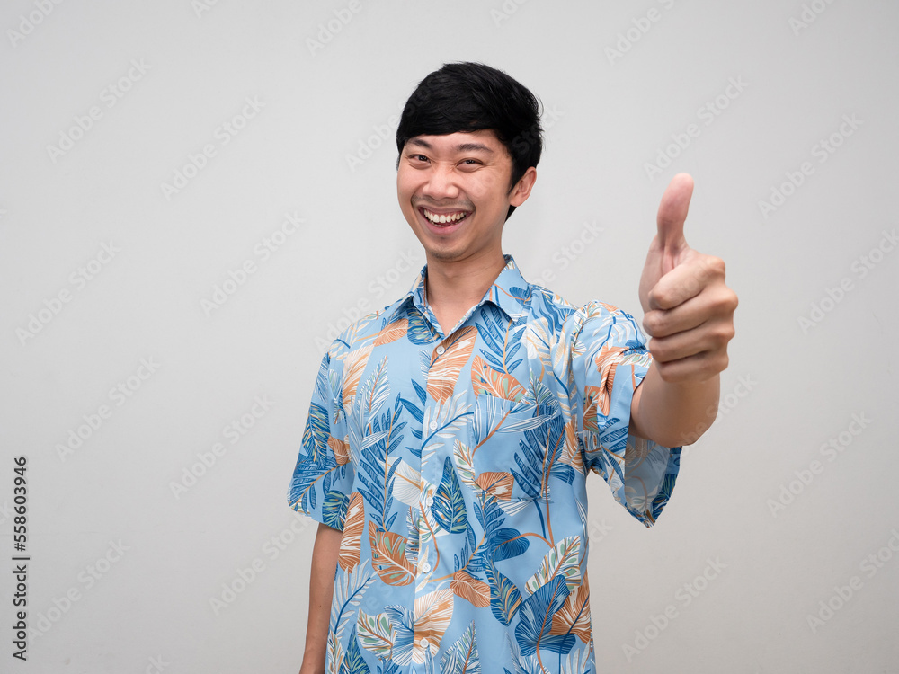 Positive asian man blue shirt happiness smile show thumb up isolated